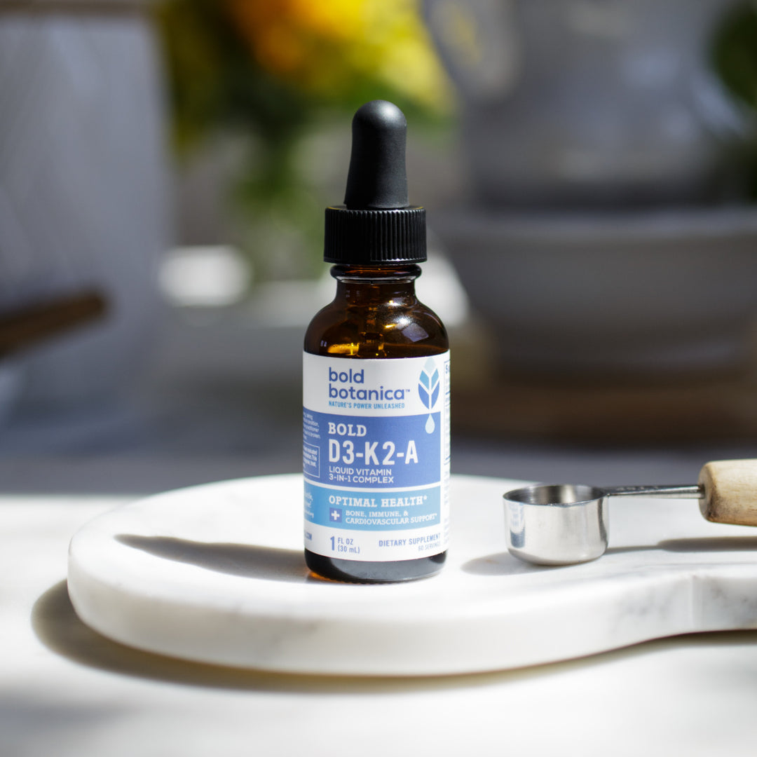 Bottle of vegan D3 K2 A supplement on a countertop