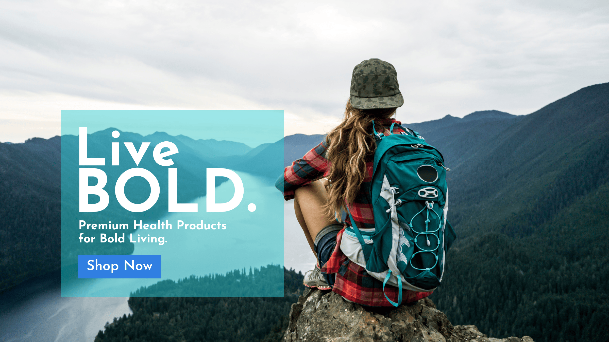 woman sitting on top of mountain