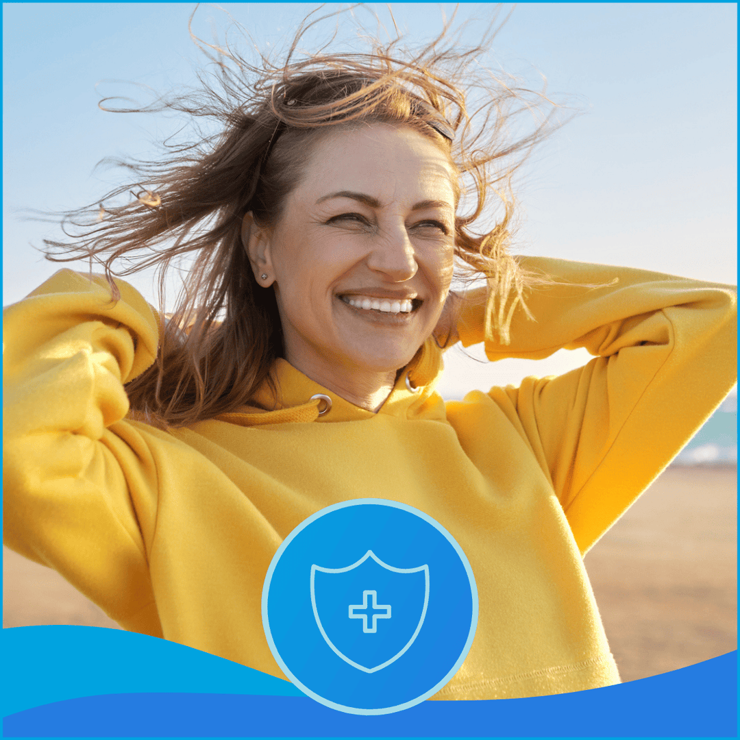 woman with a hoodie on smiling