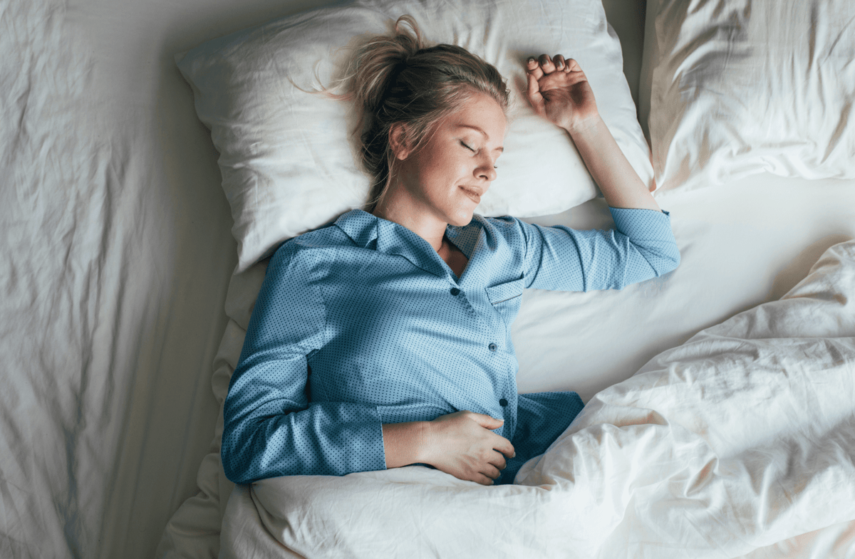 woman sleeping on a bed
