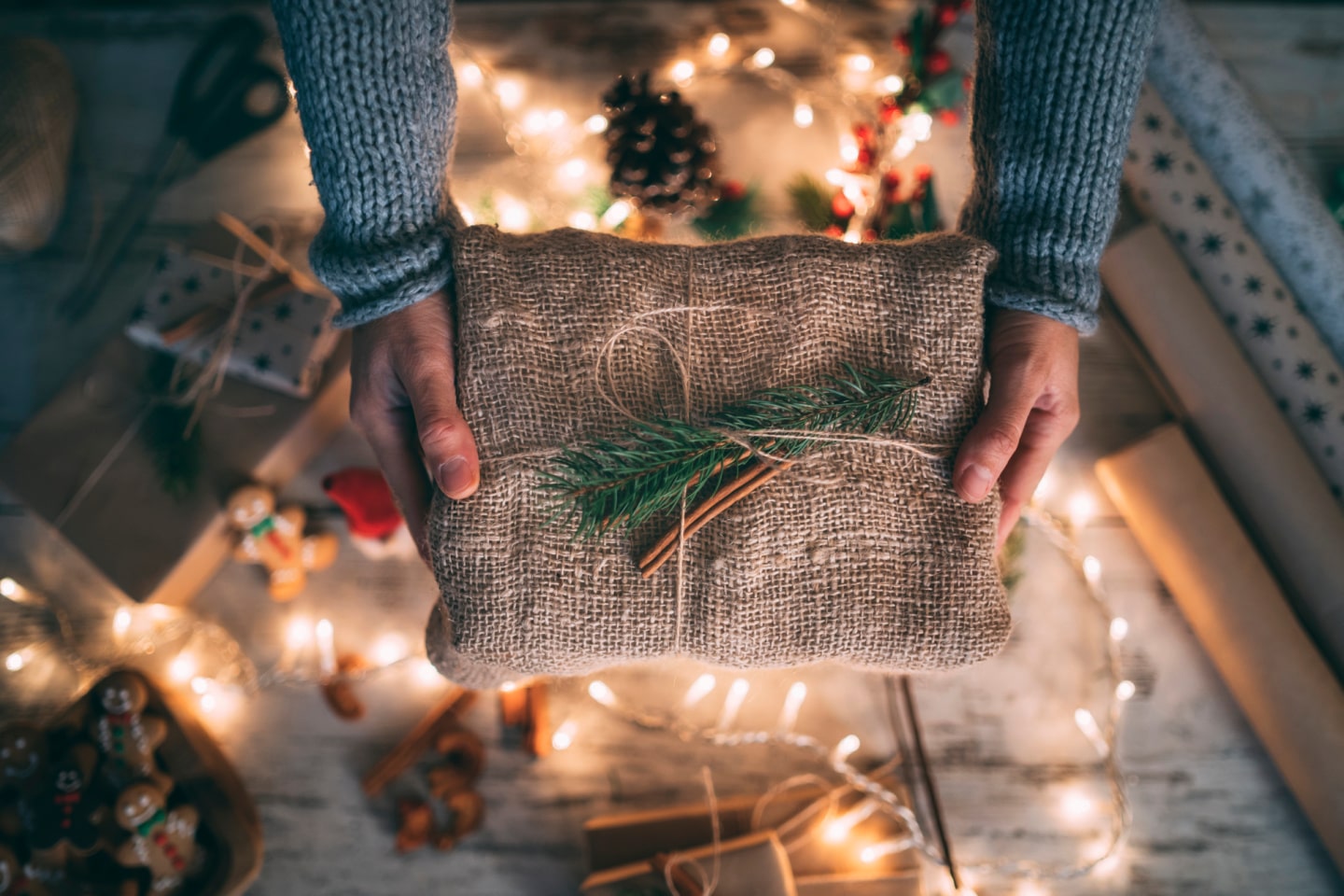 person handing out a gift