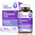 Bottle of bold botanica Bold elderberry plus  sitting next to packaging box against a white background and sitting on a white surface
