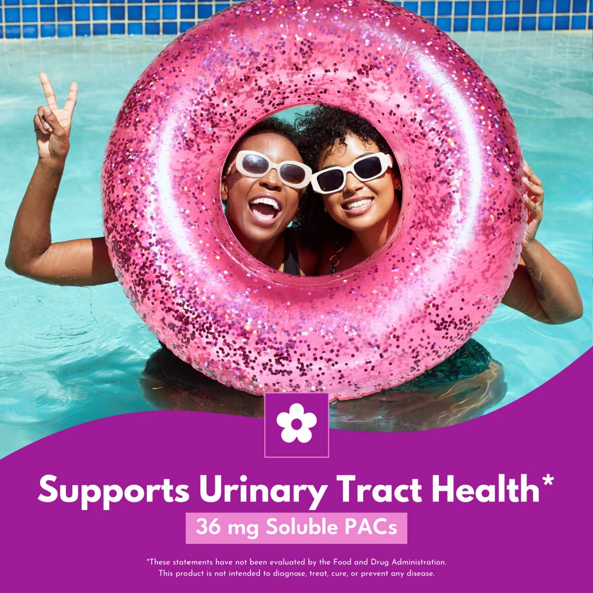 Two women in a pool smiling inside of a pink glitter float, one holding a peace sign up with, bottom of image has hot pink background with bold white text that reads Supports Urinary Tract Health 36 mg soluble PACs 
